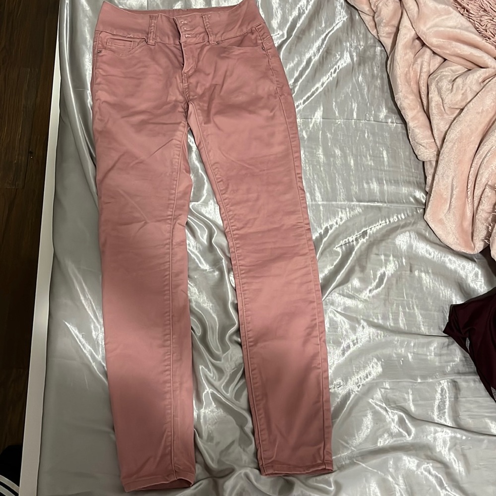 These are pink wax jeans size 3